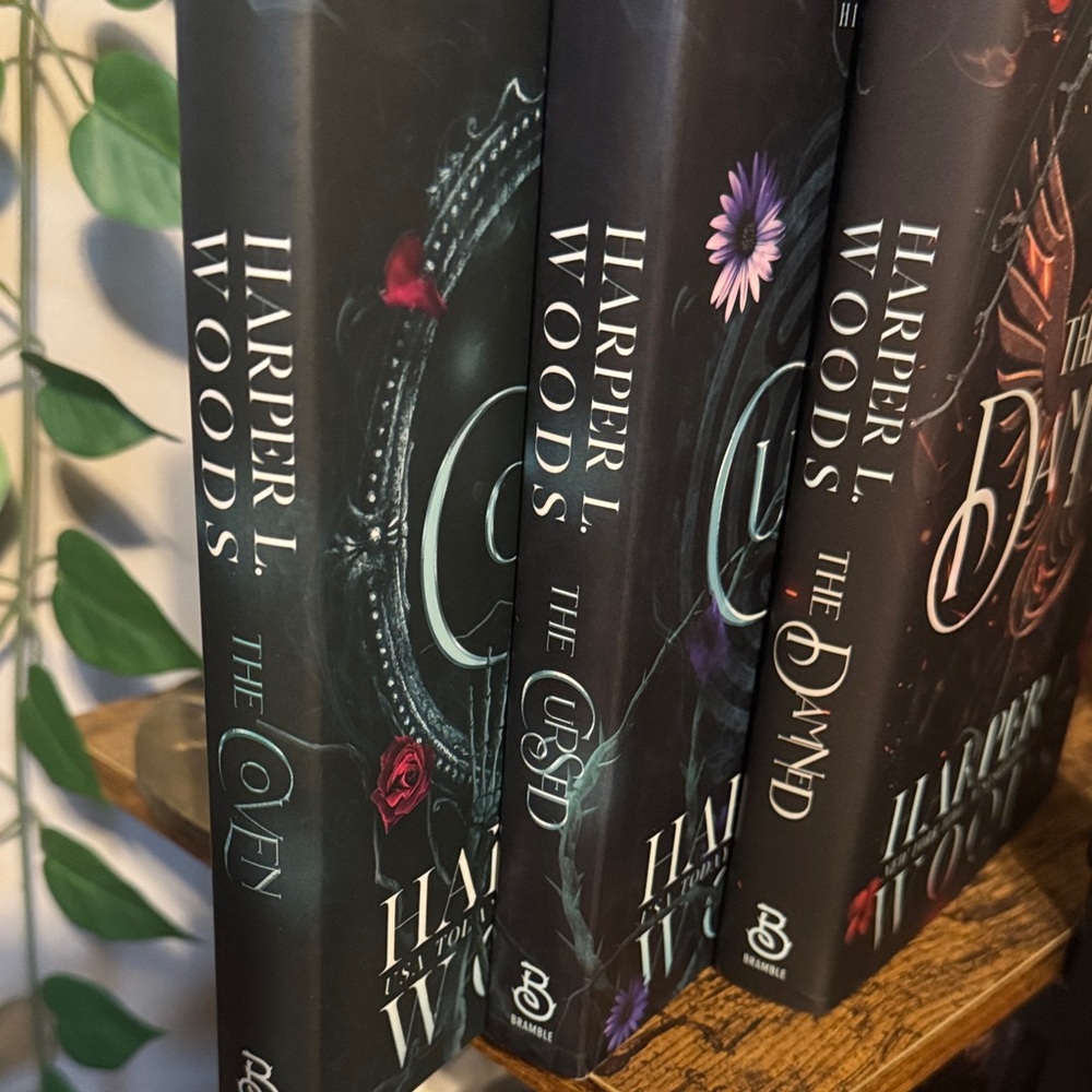 The Coven of Bones series by - Harper L Woods. Sprayed floral edges.